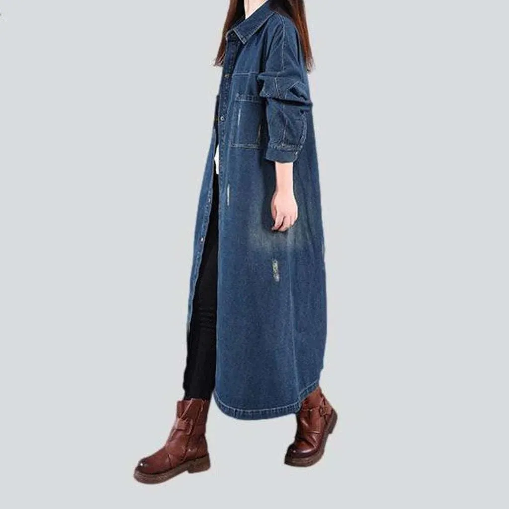 Slightly torn women's denim coat